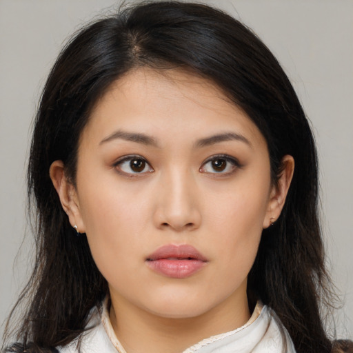 Neutral asian young-adult female with medium  brown hair and brown eyes