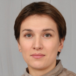 Neutral white young-adult female with short  brown hair and brown eyes