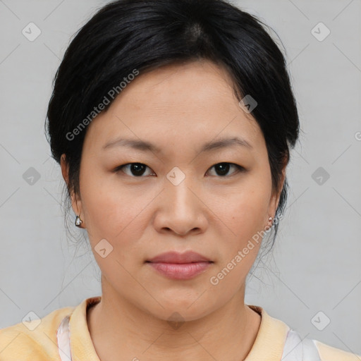 Joyful asian young-adult female with medium  brown hair and brown eyes
