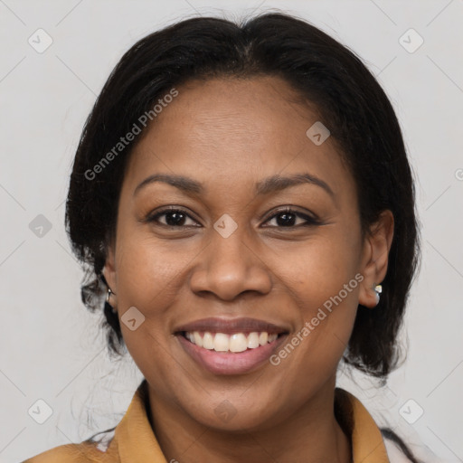 Joyful black young-adult female with medium  brown hair and brown eyes