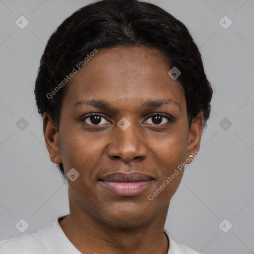 Joyful black young-adult female with short  black hair and brown eyes