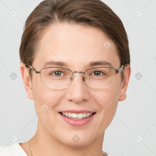 Joyful white young-adult female with short  brown hair and grey eyes