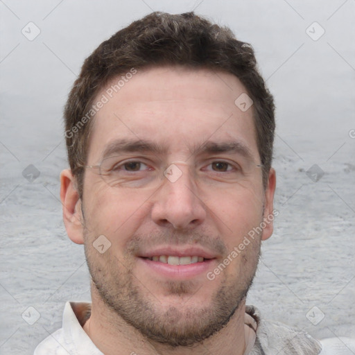 Joyful white adult male with short  brown hair and brown eyes