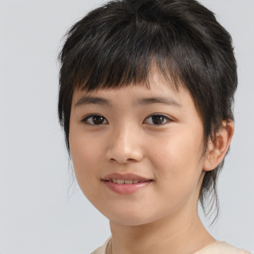 Joyful asian child female with medium  brown hair and brown eyes