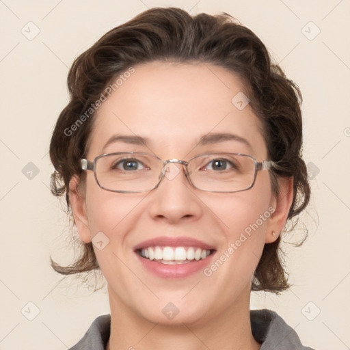 Joyful white adult female with medium  brown hair and blue eyes