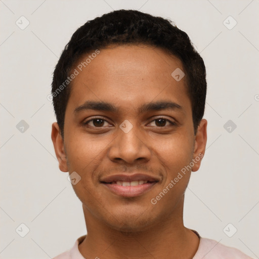 Joyful latino young-adult male with short  black hair and brown eyes