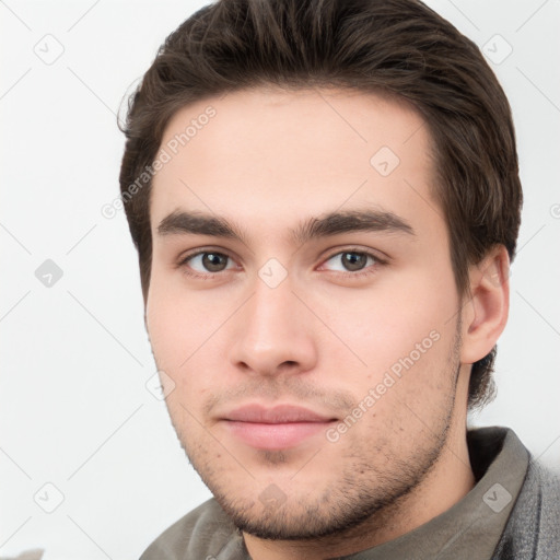 Neutral white young-adult male with short  brown hair and brown eyes