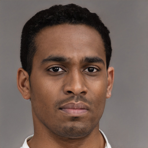 Neutral latino young-adult male with short  brown hair and brown eyes