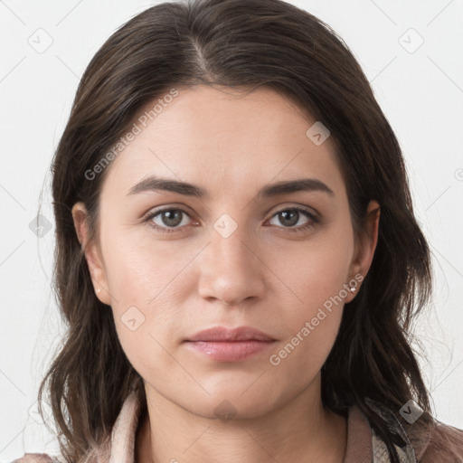 Neutral white young-adult female with long  brown hair and grey eyes