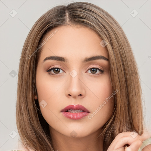 Neutral white young-adult female with long  brown hair and brown eyes