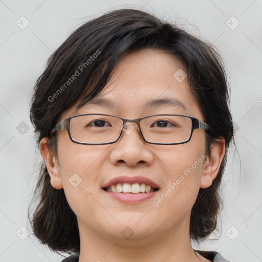 Joyful white adult female with medium  brown hair and brown eyes