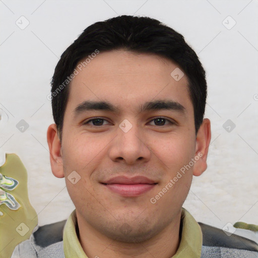 Joyful asian young-adult male with short  black hair and brown eyes