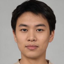 Neutral asian young-adult male with short  brown hair and brown eyes