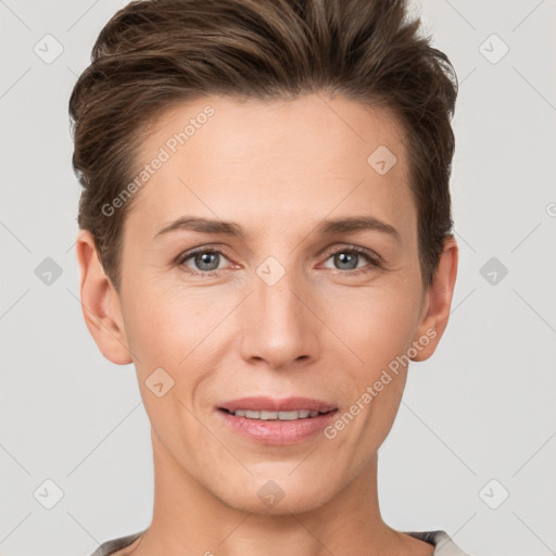 Joyful white young-adult female with short  brown hair and grey eyes