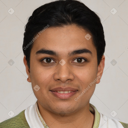 Joyful latino young-adult male with short  black hair and brown eyes