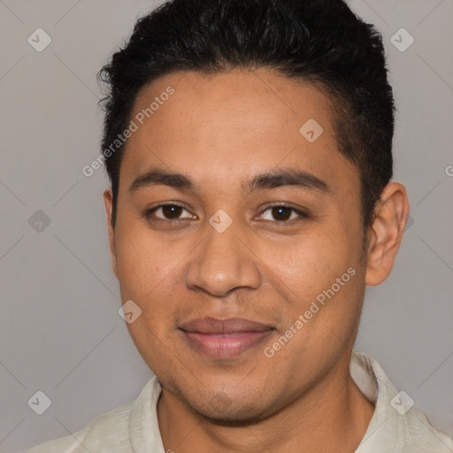 Joyful latino young-adult male with short  black hair and brown eyes