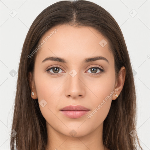 Neutral white young-adult female with long  brown hair and brown eyes