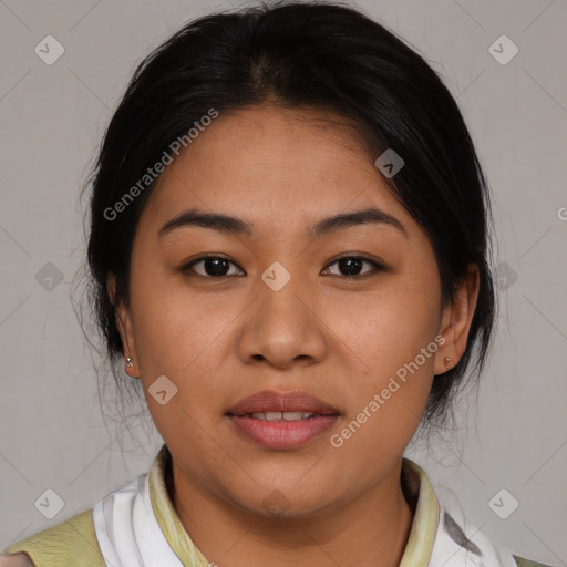 Joyful latino young-adult female with medium  brown hair and brown eyes