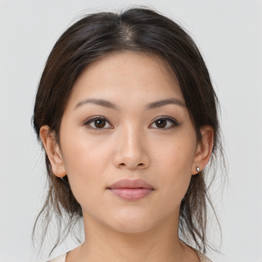 Neutral asian young-adult female with medium  brown hair and brown eyes
