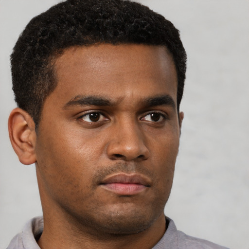 Neutral latino young-adult male with short  brown hair and brown eyes