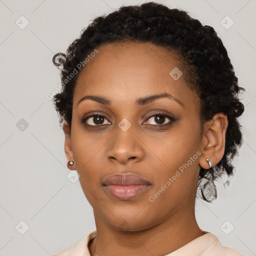 Neutral black young-adult female with short  black hair and brown eyes