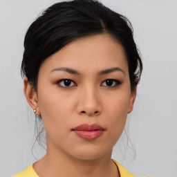 Neutral asian young-adult female with medium  black hair and brown eyes