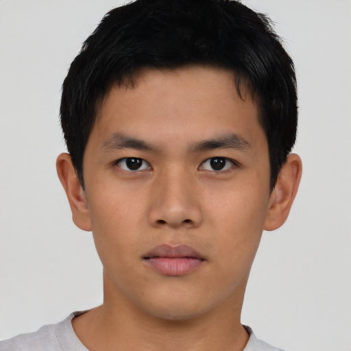 Neutral asian young-adult male with short  brown hair and brown eyes