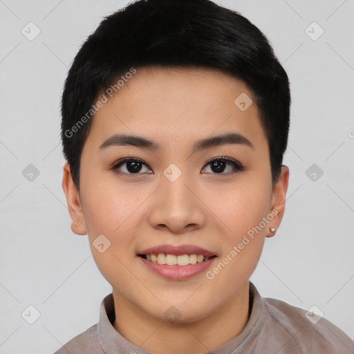 Joyful asian young-adult female with short  black hair and brown eyes