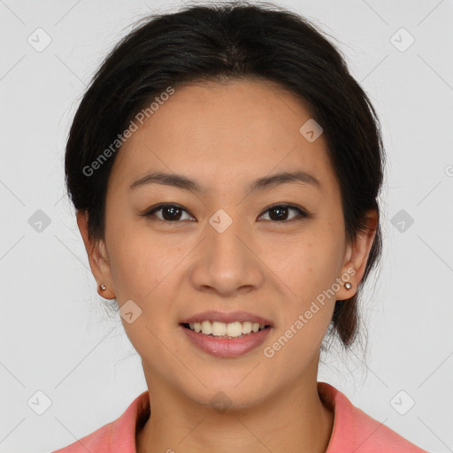 Joyful latino young-adult female with medium  brown hair and brown eyes