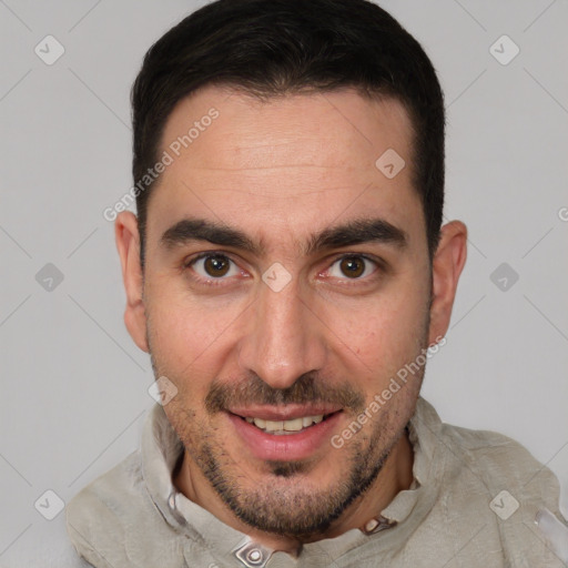 Joyful white young-adult male with short  brown hair and brown eyes