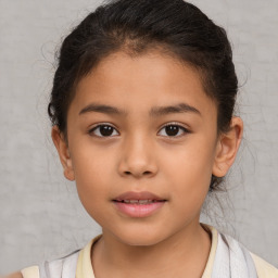 Joyful white child female with short  brown hair and brown eyes