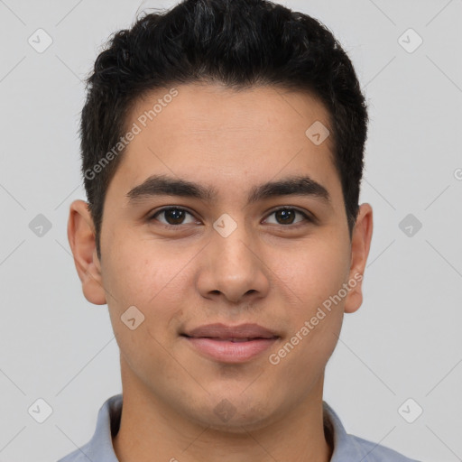 Joyful latino young-adult male with short  brown hair and brown eyes