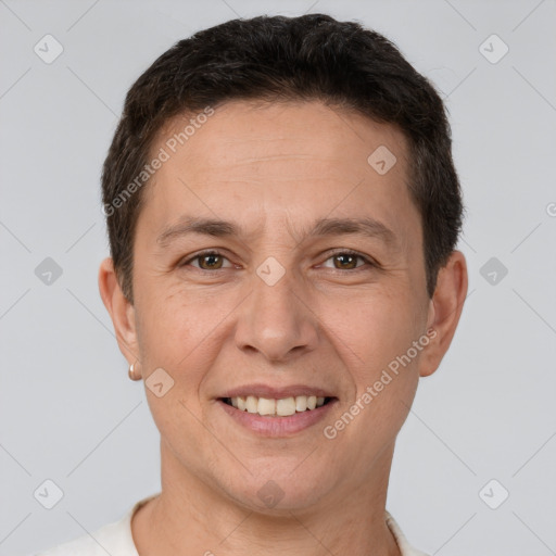 Joyful white adult male with short  brown hair and brown eyes