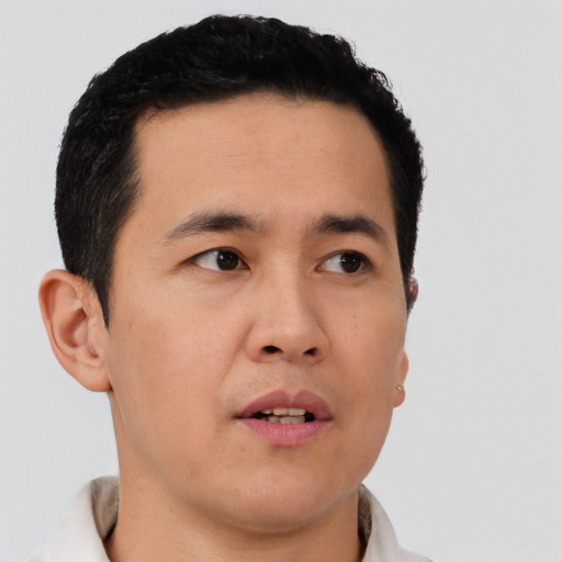 Neutral asian young-adult male with short  brown hair and brown eyes