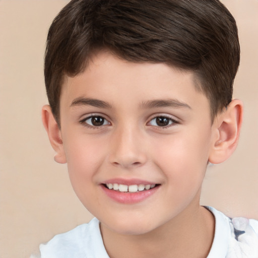 Joyful white child male with short  brown hair and brown eyes