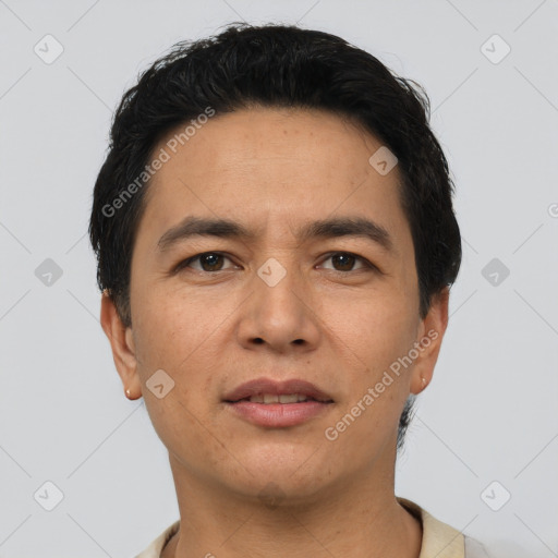 Joyful asian young-adult male with short  black hair and brown eyes