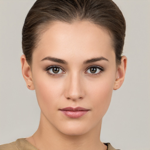 Neutral white young-adult female with medium  brown hair and brown eyes