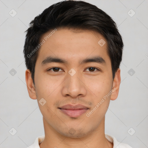 Joyful asian young-adult male with short  black hair and brown eyes