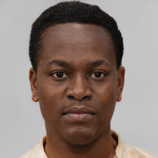 Neutral black young-adult male with short  brown hair and brown eyes