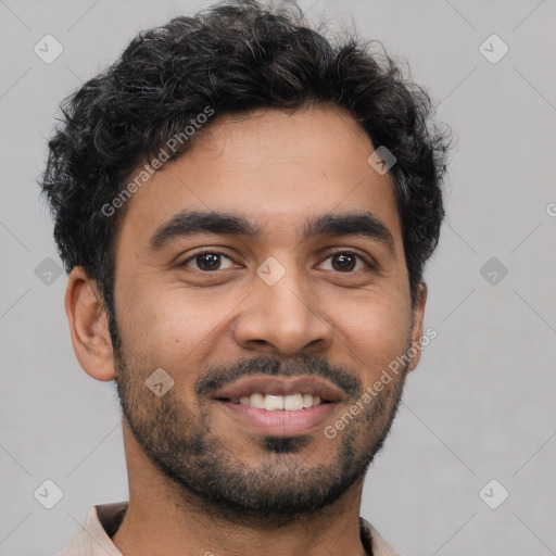 Joyful latino young-adult male with short  black hair and brown eyes