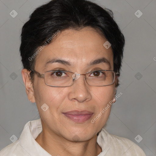 Joyful white adult female with short  brown hair and brown eyes