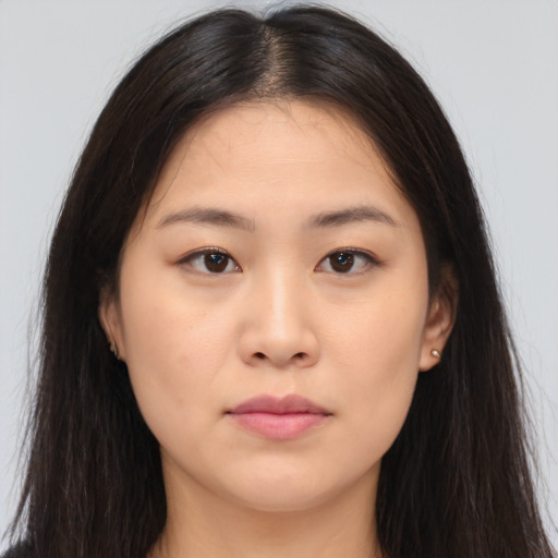 Neutral asian young-adult female with long  brown hair and brown eyes