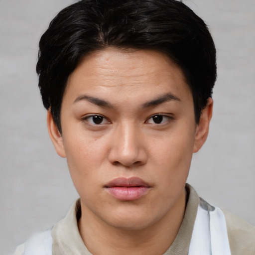 Neutral asian young-adult female with short  brown hair and brown eyes