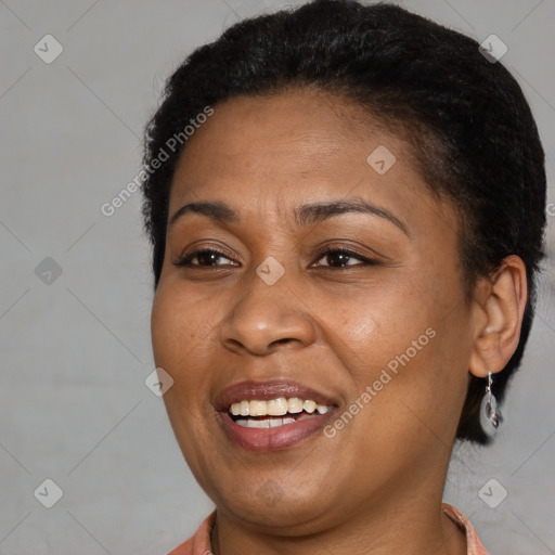 Joyful black young-adult female with short  brown hair and brown eyes