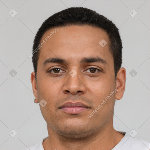 Neutral latino young-adult male with short  black hair and brown eyes