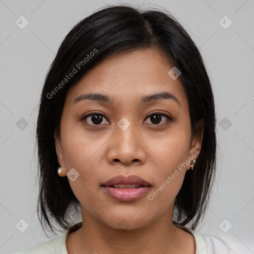 Joyful asian young-adult female with medium  brown hair and brown eyes