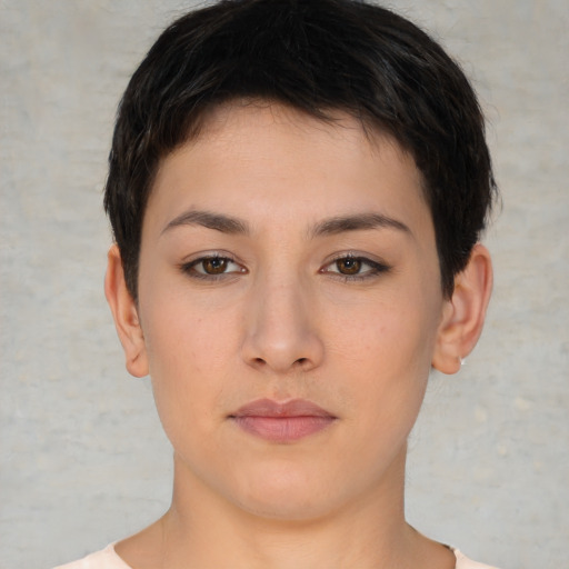 Neutral white young-adult female with short  brown hair and brown eyes