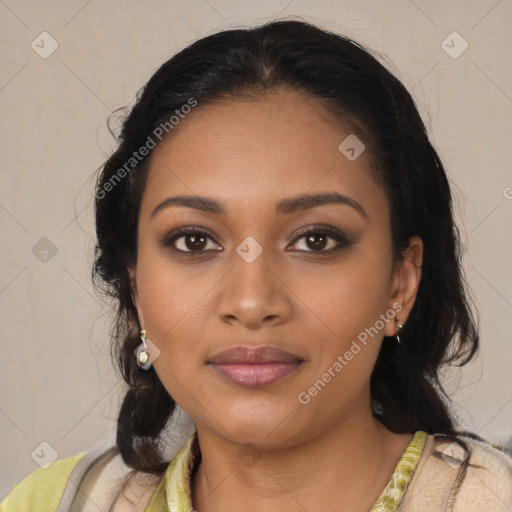 Joyful black young-adult female with long  black hair and brown eyes