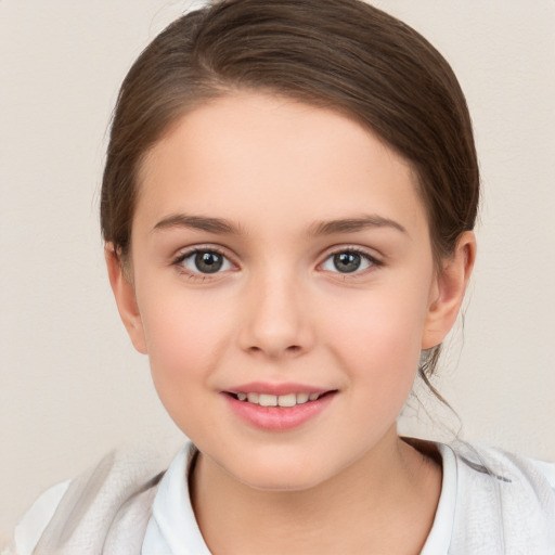 Joyful white child female with medium  brown hair and brown eyes