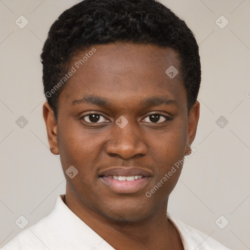 Joyful black young-adult male with short  brown hair and brown eyes